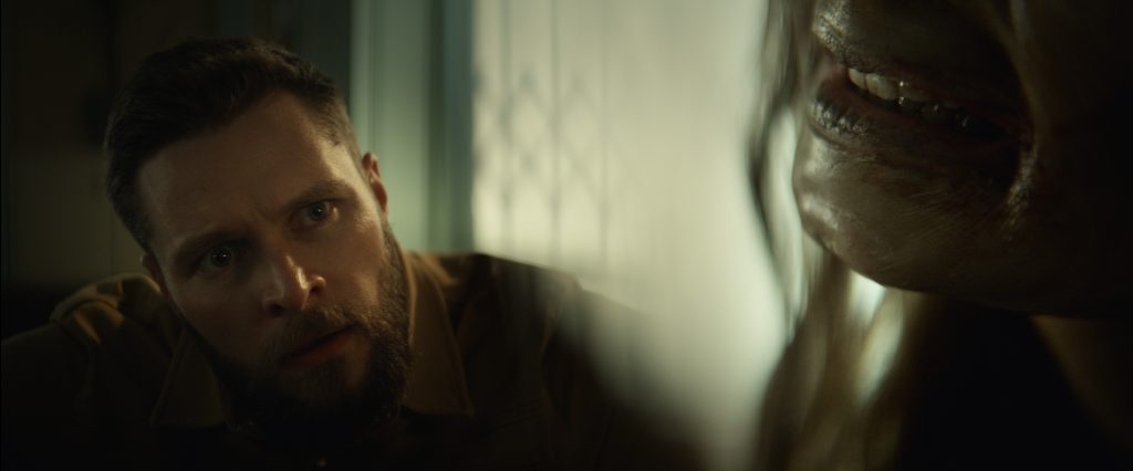 Lee Cronin's The Mummy - Jack Reynor looks at his daughter. 