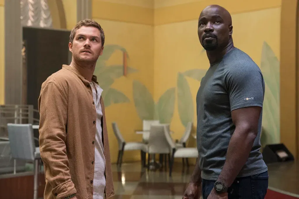 Finn Jones as Iron Fist and Mike Colter as Luke Cage