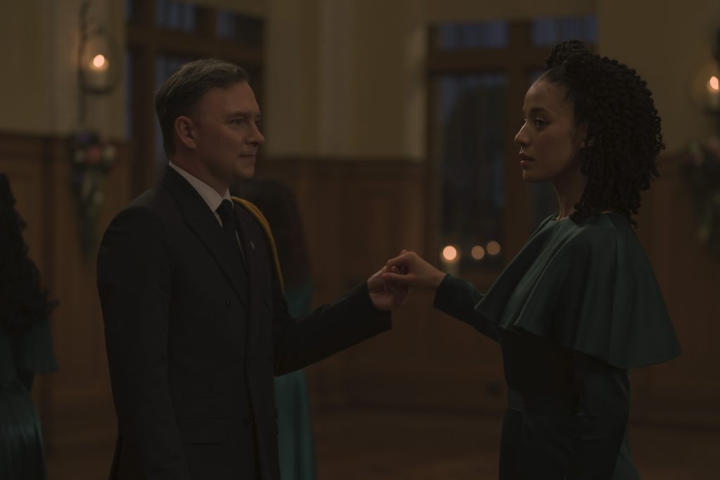 THE TESTAMENTS season 1 Episode 5 - “Ball” - At a debutante-style ball where Green girls are paraded before Commanders; the illusion of elegance begins to fray. Agnes discovers Garth’s status has changed. (Disney/Steve Wilkie)
NATE CORDDRY, CHASE INFINITI