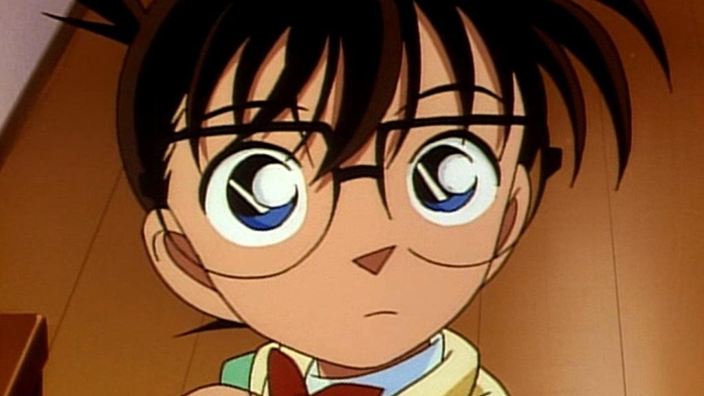 conan looking at something in the anime
