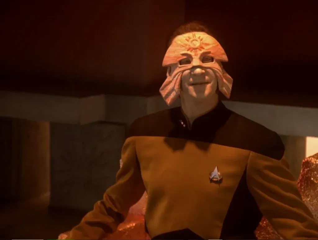Brent Spiner as Data wearing a mask