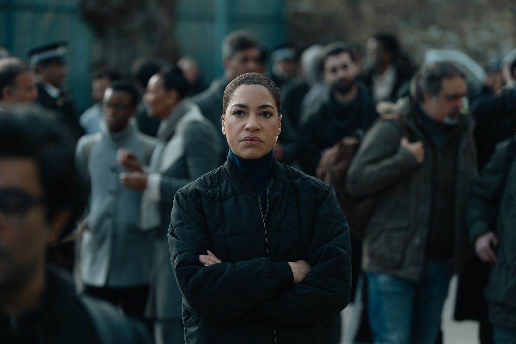 Cush Jumbo watches from a distance in CRIMNAL RECORD.