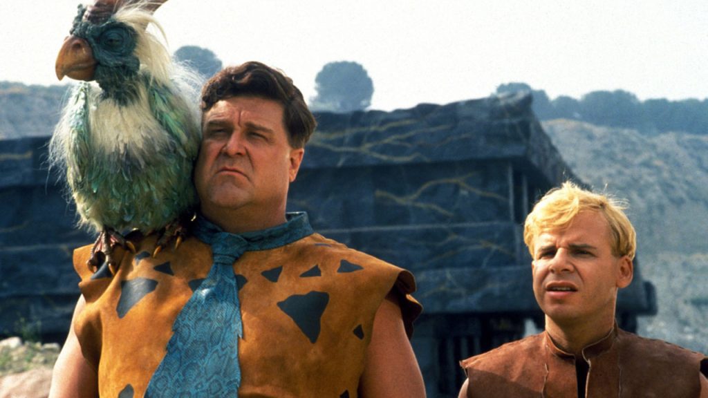 Rick Moranis with John Goodman in The Flintstones