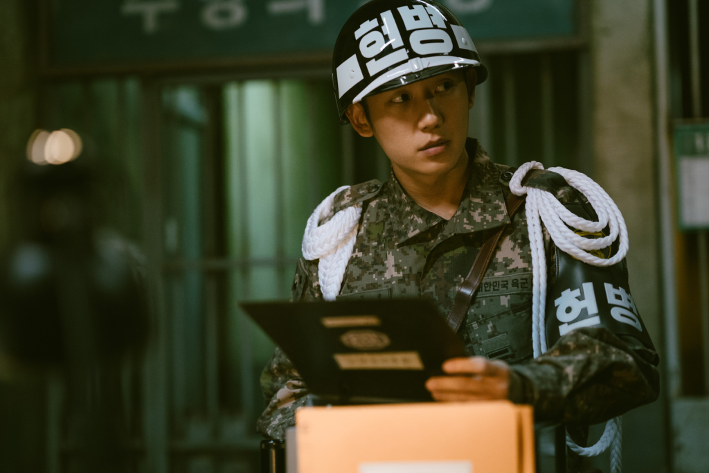 a still from d.p, via netflix 