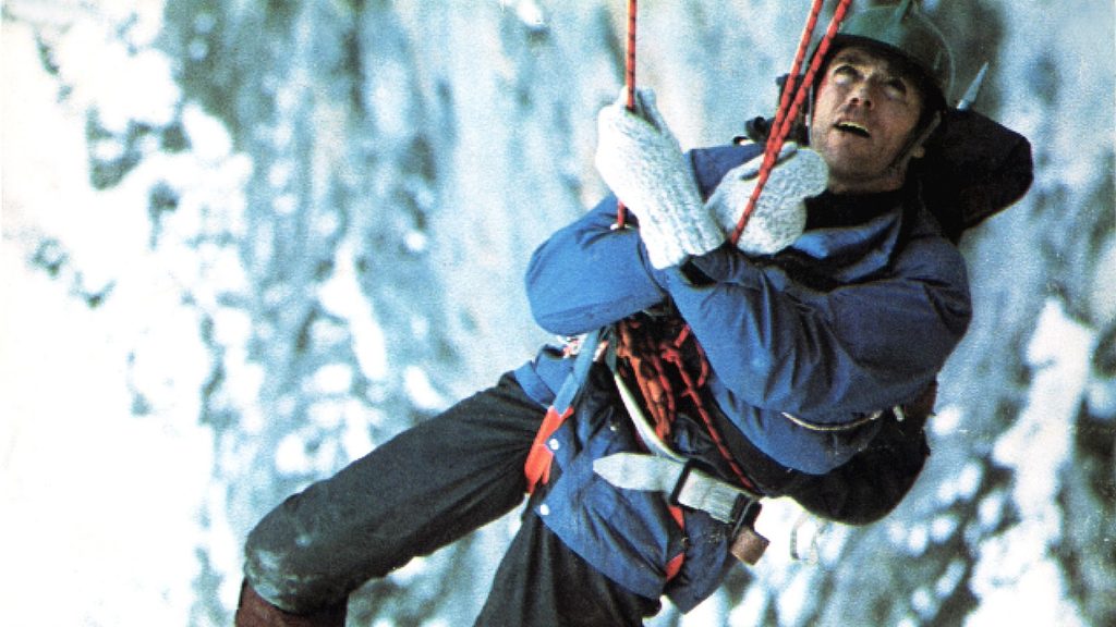 Clint Eastwood hangs off a mountain