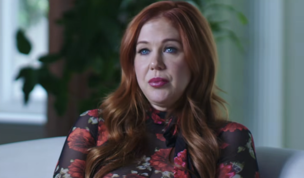 Maitland Ward wearing a floral dress