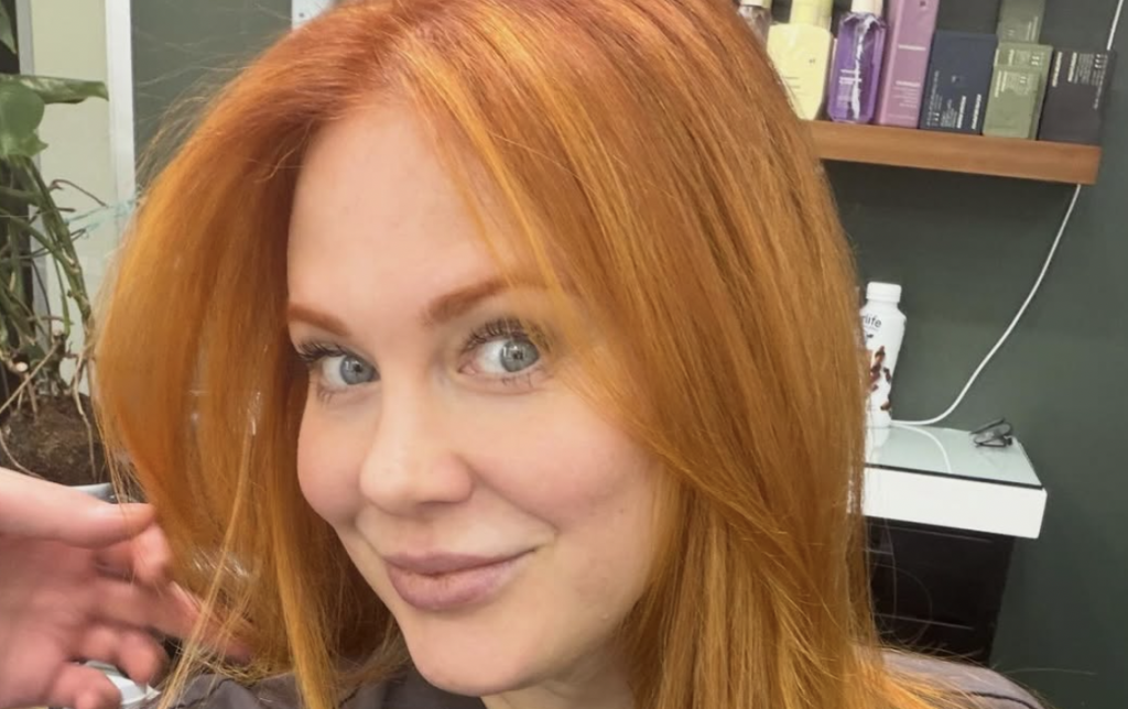 Maitland Ward with auburn hair 
