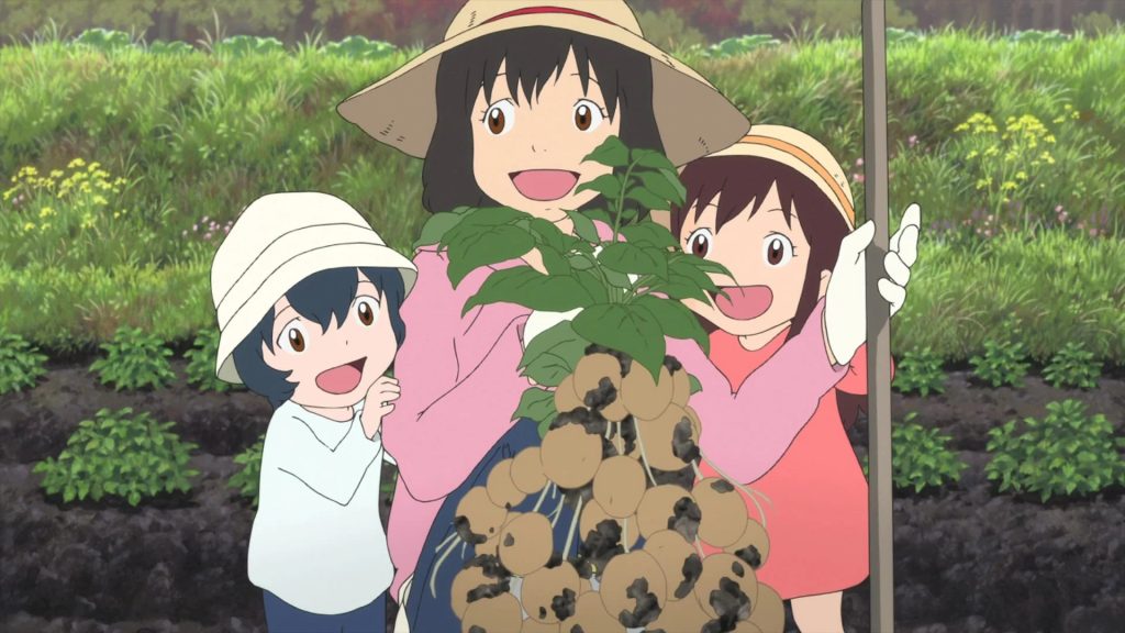 Yuki, Ame, and Hana pulling out a plant