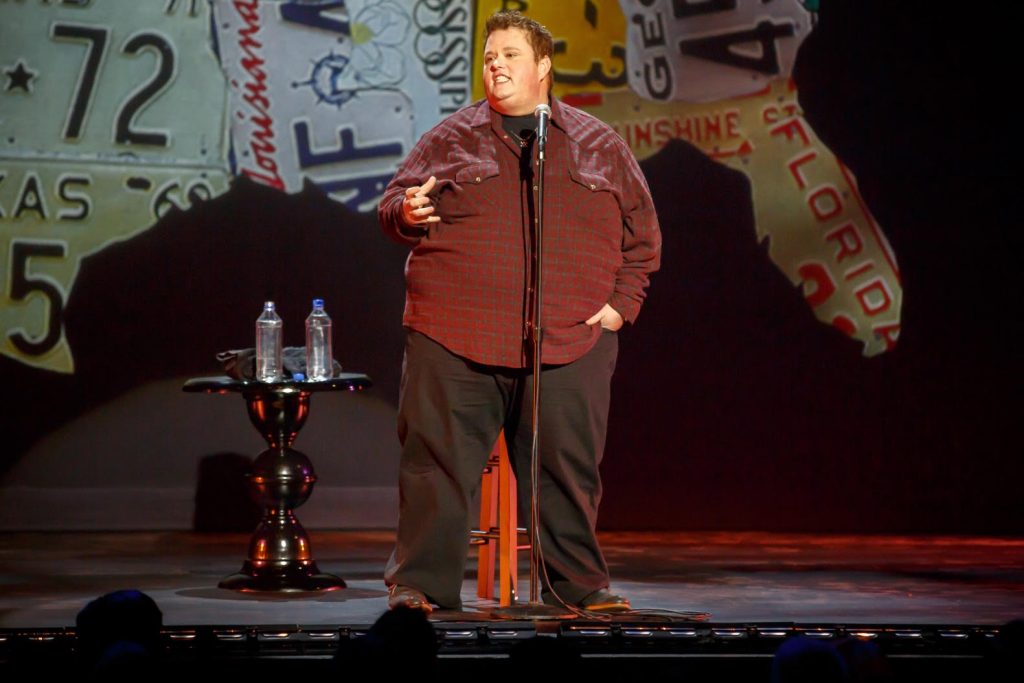 Ralphie May on stage in Come What May