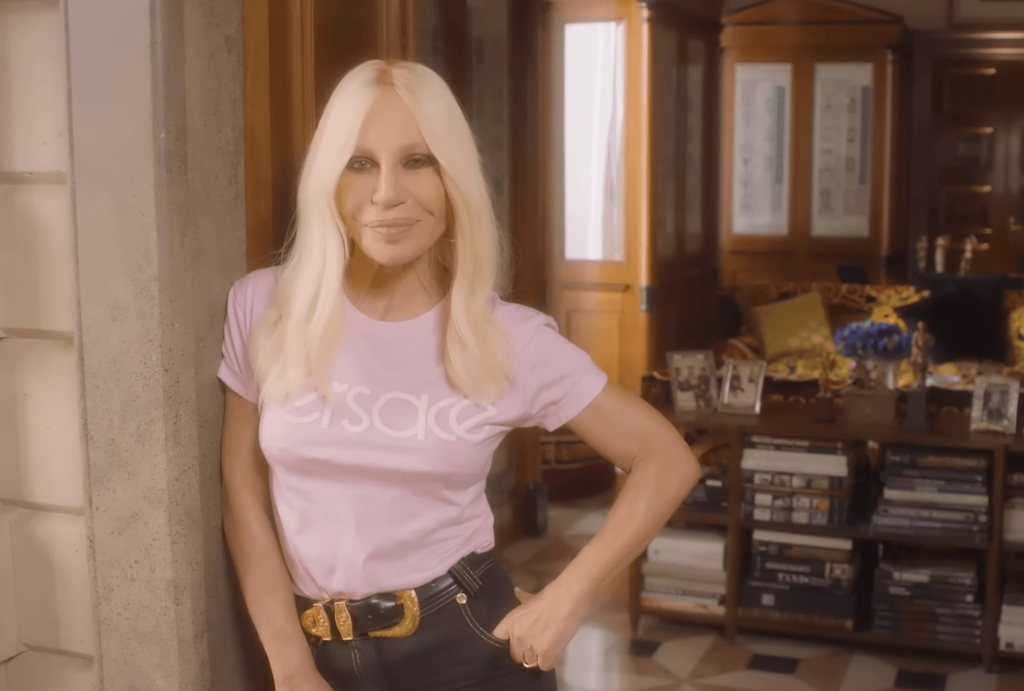 Donatella Versace in a pink Versace top 