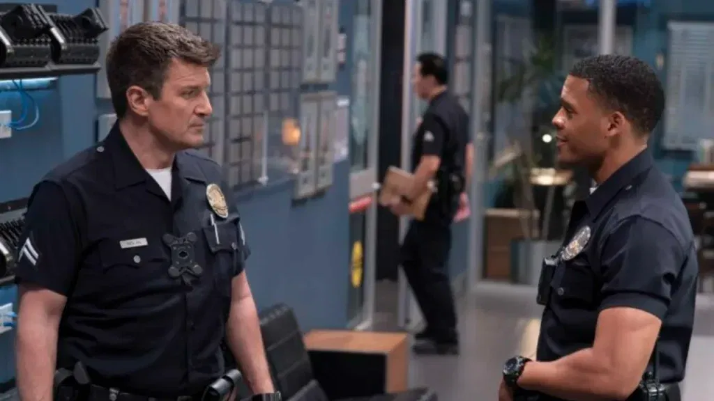 Deric Augustine and Nathan Fillion as Miles Penn and John Nolan in The Rookie