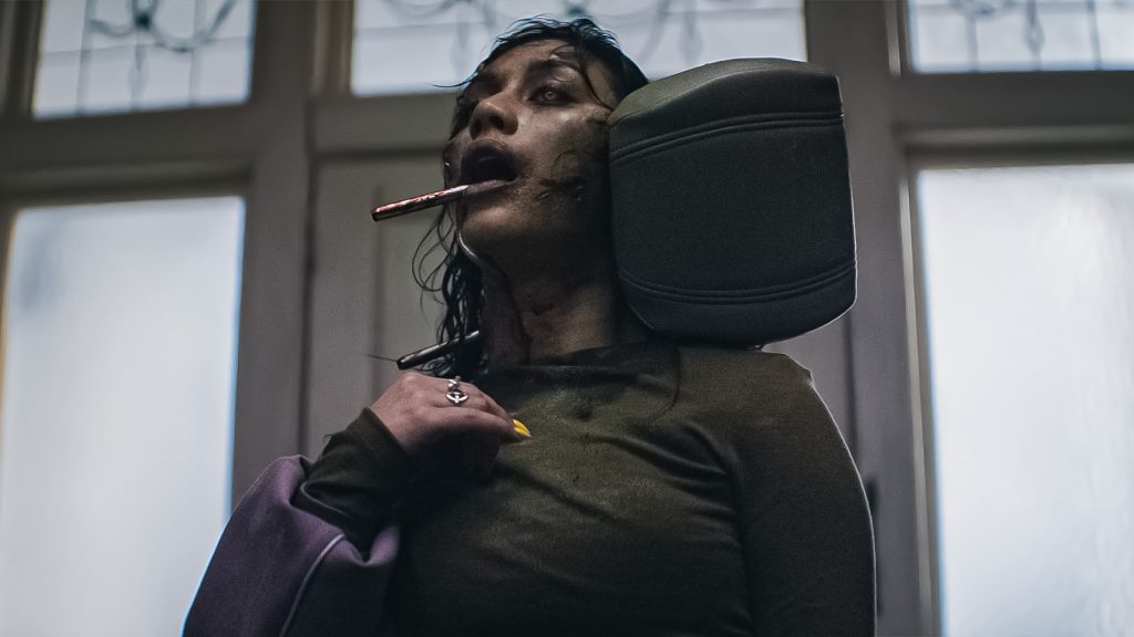 luciane buchanan as thya in evil dead burn