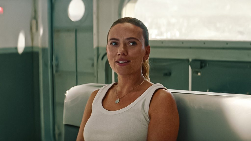 scarlett johansson as zora bennett smiling in jurassic world rebirth