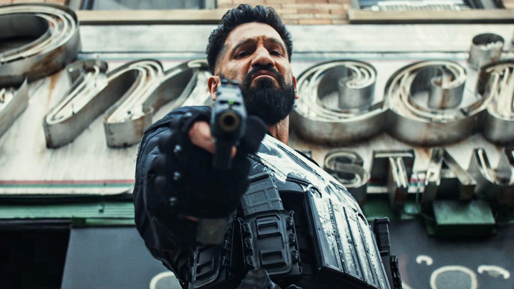 jon bernthal in the punisher one last kill, holding a gun 