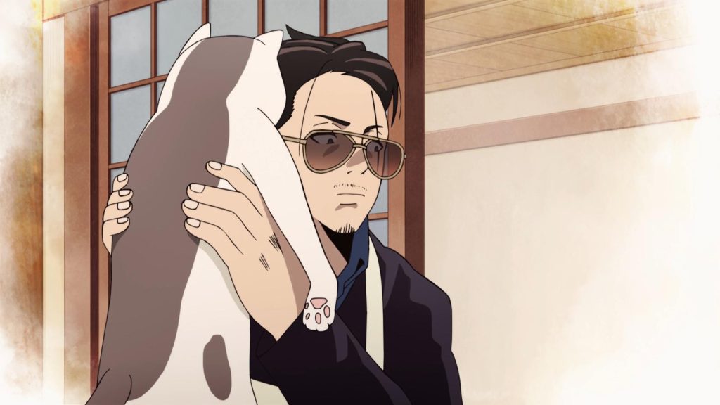 tatsu holding a cat in the way of househusband