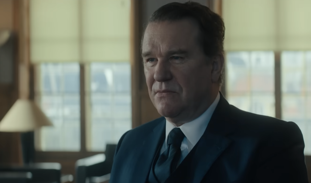 Douglas Hodge in a suit 
