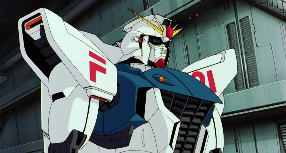 The machine is the F91 Gundam F91, developed by the Strategic Naval Research Institute. 
