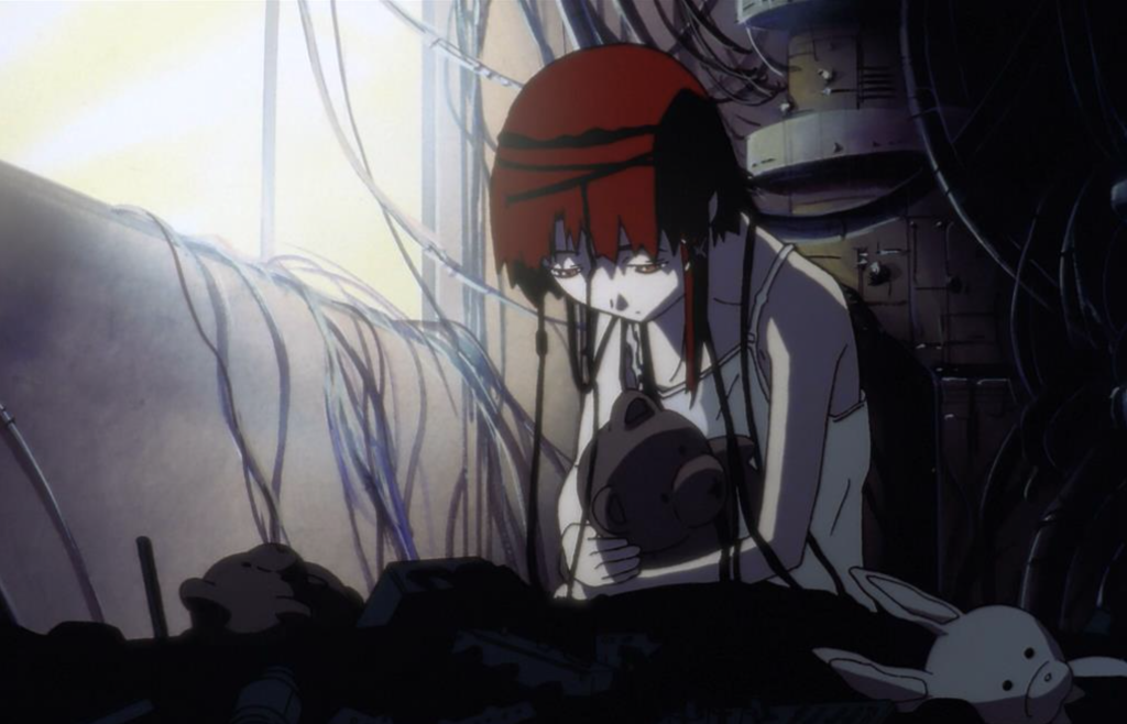 a close up image of lain iwakura sitting in a dark room with pipes stuck throughout her body in serial experiments lain anime