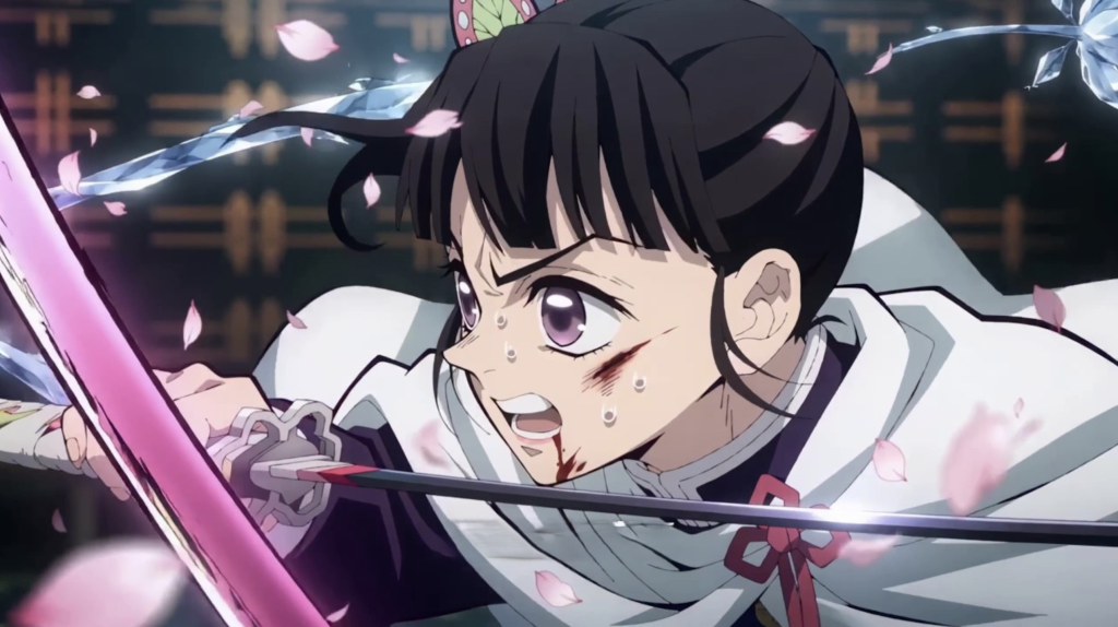 a close up still image of kanao tsuyuri fighting in demon slayers anime series