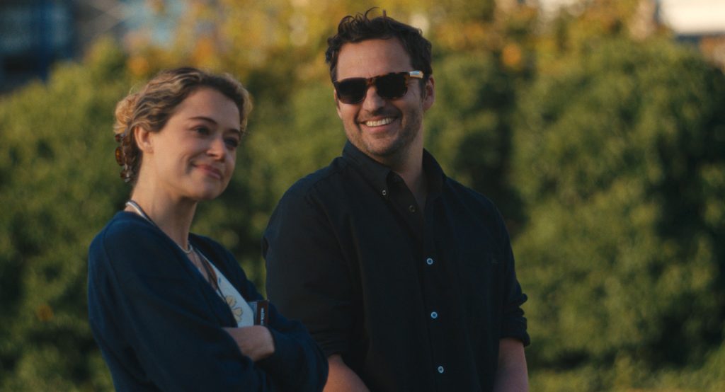 Tatiana Maslany and Jake Johnson in "Maximum Pleasure Guaranteed," premiering May 20, 2026 on Apple TV.