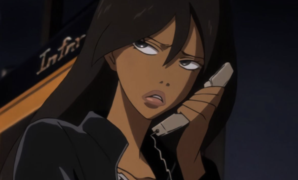 a close up image of michiko speaking over a phone from michiko and hatchin anime series