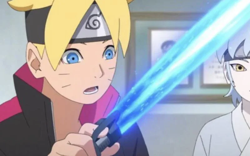 This image features characters from the anime series Boruto Naruto Next Generations where Boruto is shown in the foreground holding a glowing blue blade known as a Scientific Ninja Tool while the character in the background with light-colored hair and yellow eyes is Mitsuki