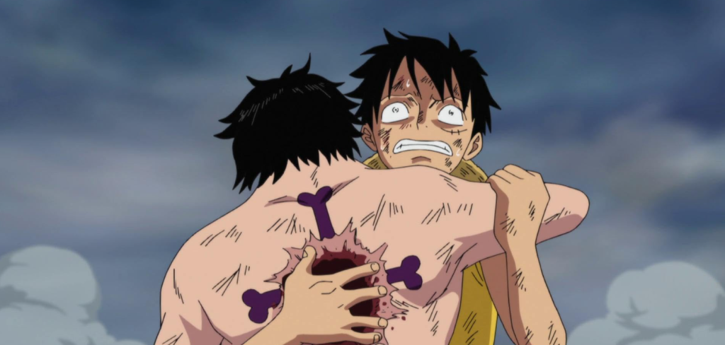 Ace sacrifices himself to save Luffy from an attack by Admiral Akainu.