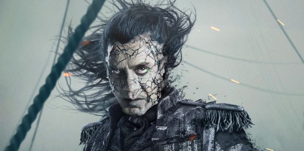  Dead Men Tell No Tales, portrayed with a cracked, ghostly face, windblown dark hair, and a tattered naval uniform against a stormy maritime backdrop.