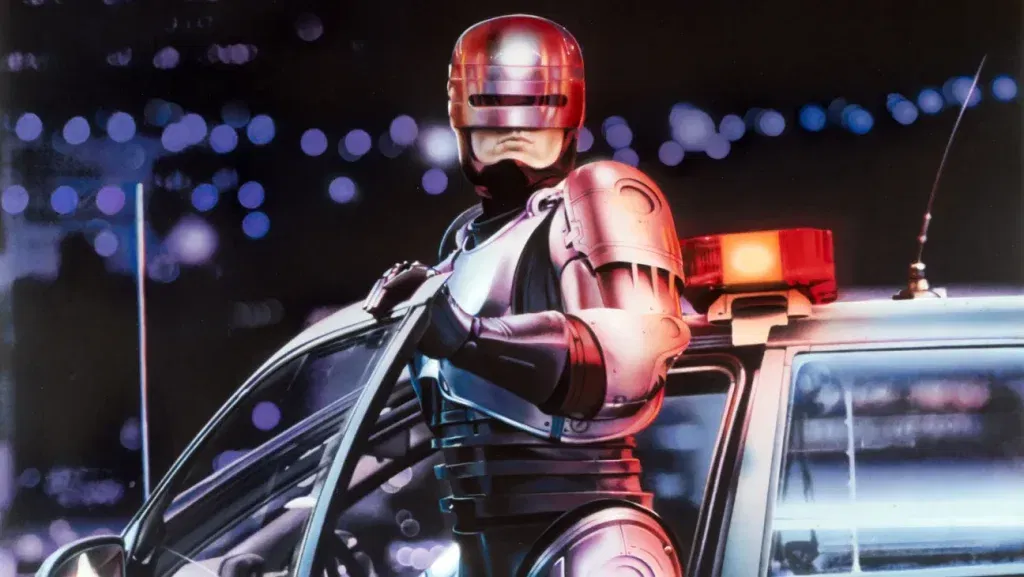 RoboCop comes out of a car