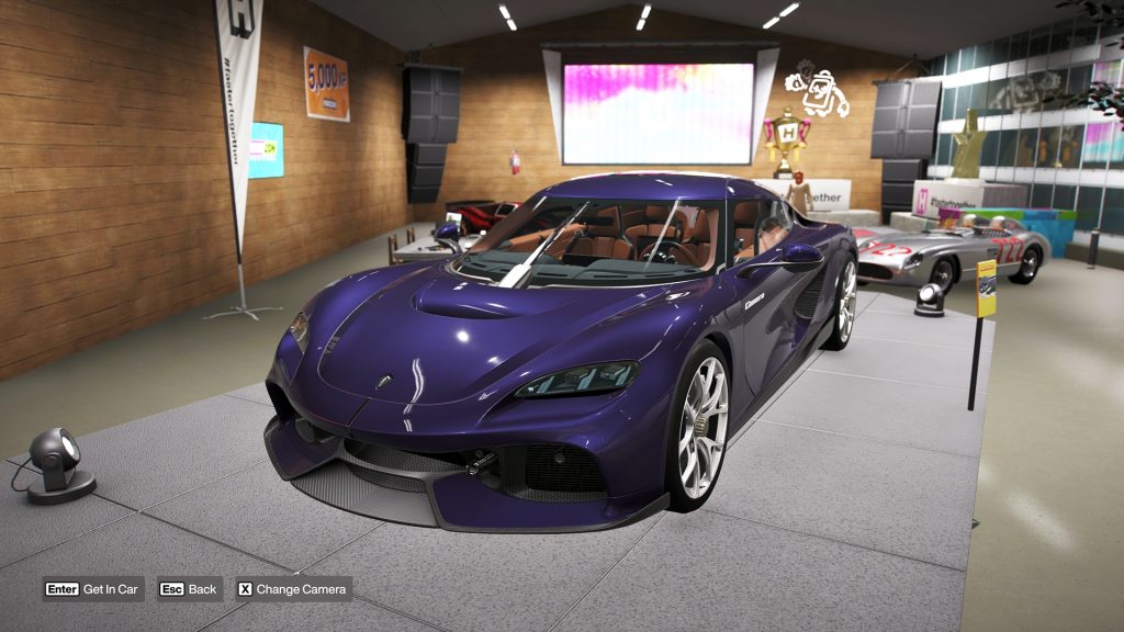 The Koenigsegg Gemera showcased inside the Forza Horizon 6 garage display area.
