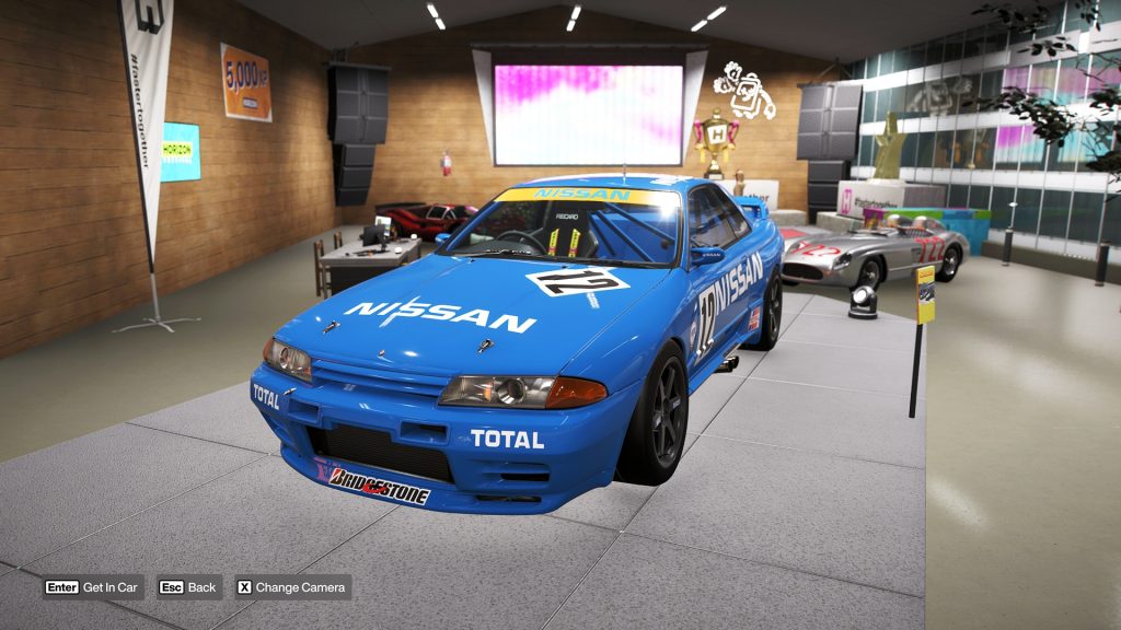 The Nissan #12 Skyline GT-R (BNR32 Gr.A) JTC featured on a garage podium in Forza Horizon 6.