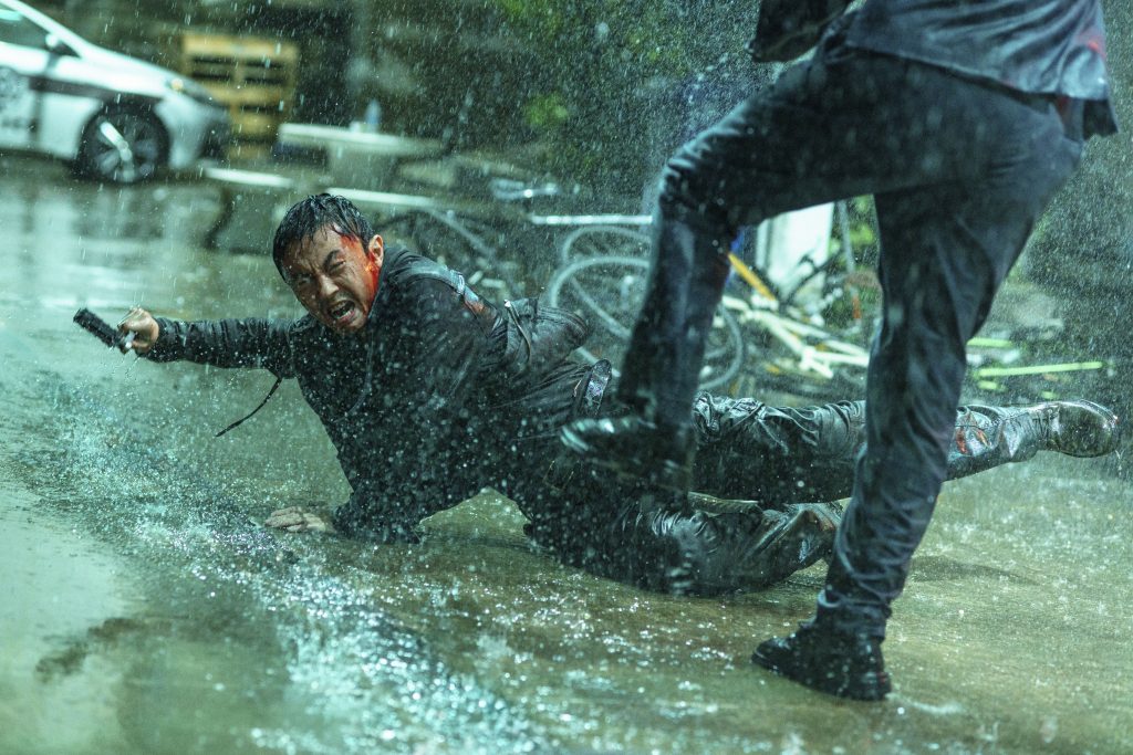 Xie Miao in an intense fight scene in The Furious