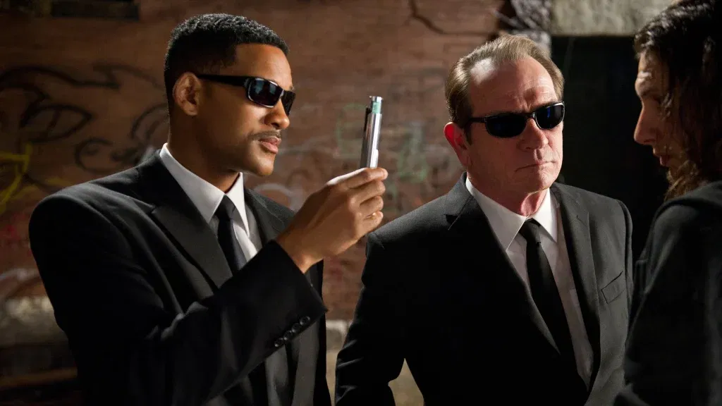 Will Smith shows a device