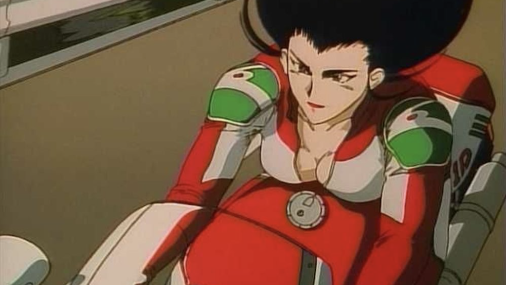 This image features the character Reiko Terayama from the 1990s anime series Golden Boy and she is depicted riding her high-performance motorcycle while wearing a distinctive red, white, and green racing suit