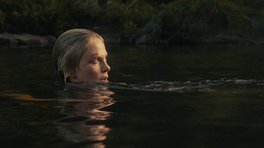 Charlize Theron in the water