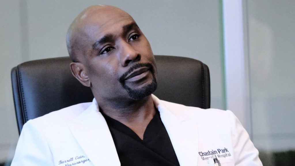Morris Chestnut in The Resident looking amused