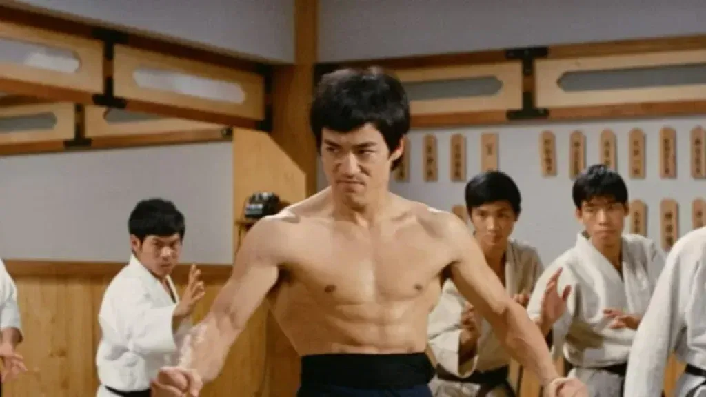10 Must-Watch Hong Kong Action Movies, Including The Furious, Ranked 11 Bruce Lee in a still from Fist of Fury