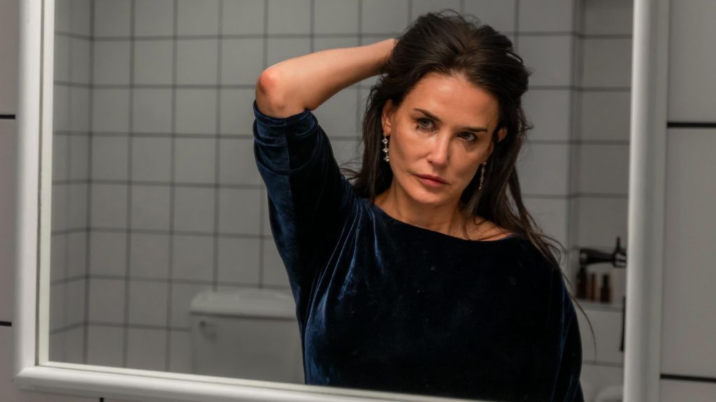 7 Affordable Streaming Platforms for Indie Movie Fans Tired of Hollywood Blockbusters 3 Demi Moore looks at herself in the mirror