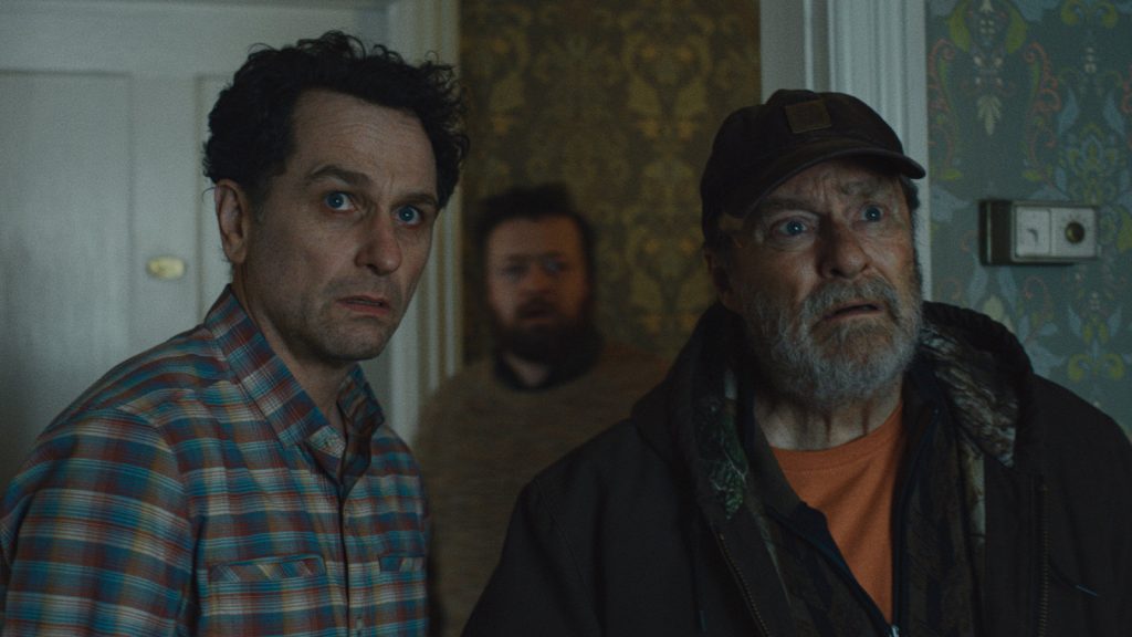 Matthew Rhys And Stephen Root in Widow’s Bay