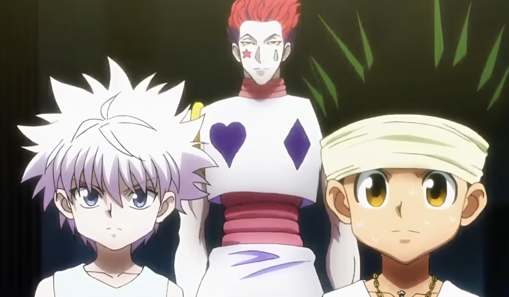 This image shows characters Gon Freecss, Killua Zoldyck, and Hisoka Morow from the anime series Hunter × Hunter, specifically from the Greed Island arc