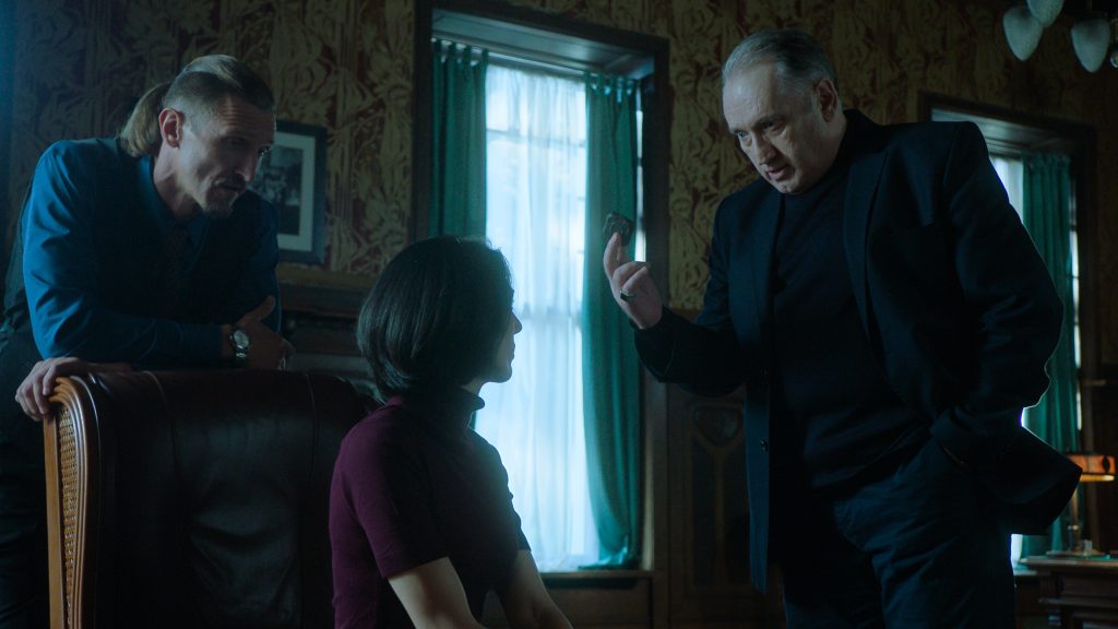kyril orna and mikhail in a conversation in unconditional