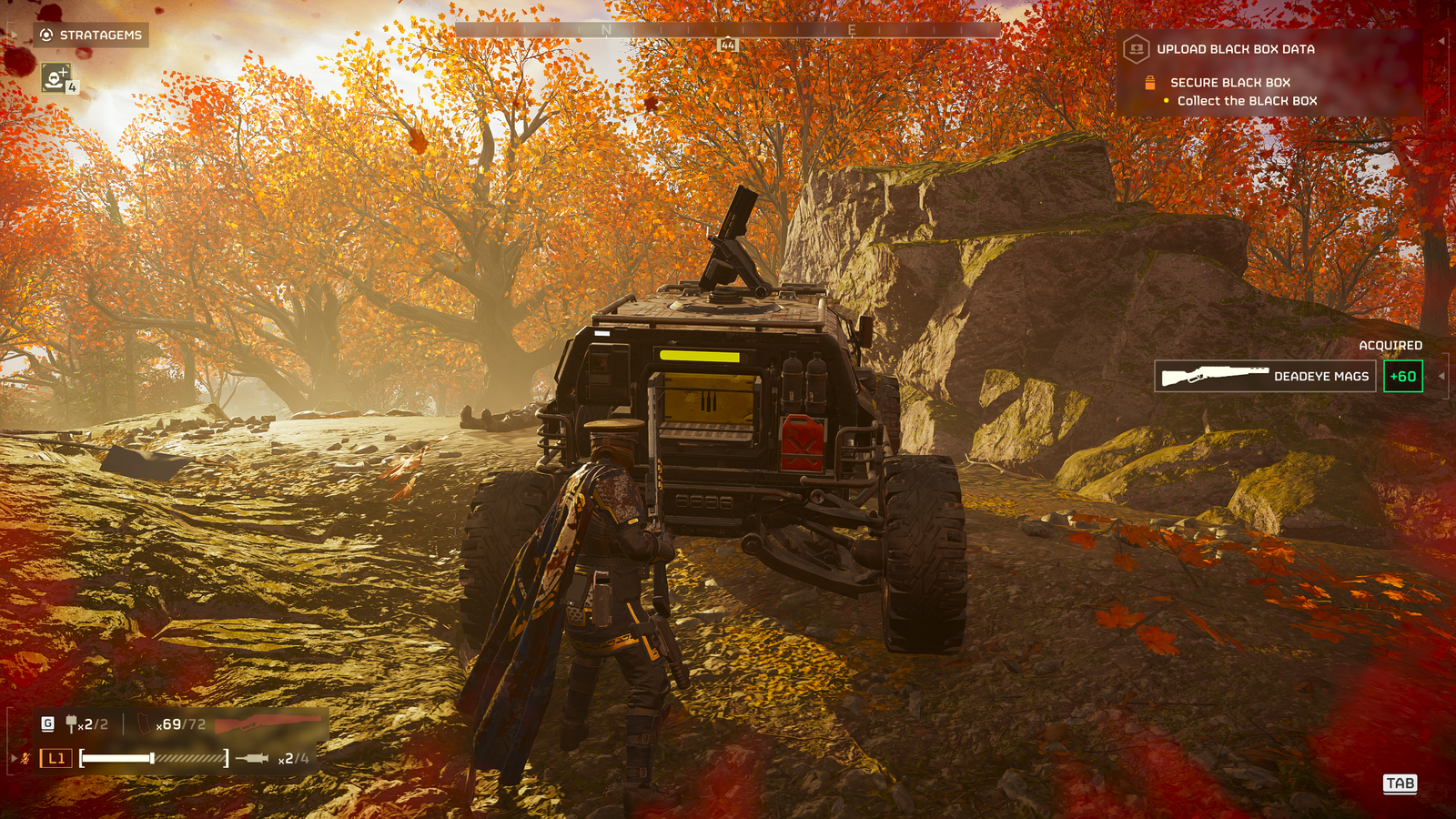 Helldivers 2 gameplay screenshot shows the player resupplying from the M-103 Supply FRV.