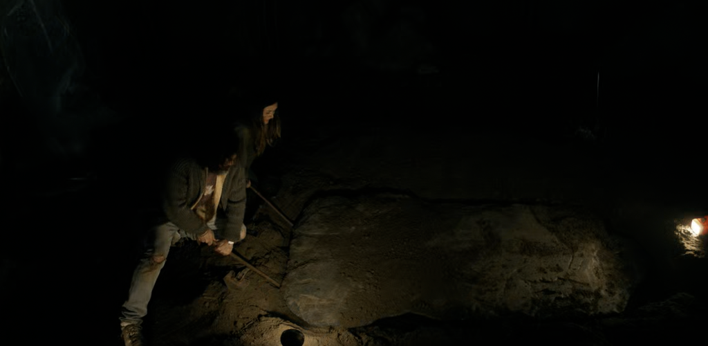 Jade and Tabitha opening a grave in FROM