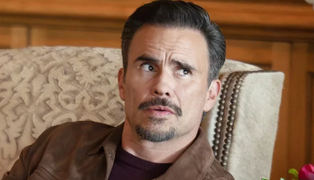 Joaquin (Juan Pablo Raba) sitting in a chair on Dutton Ranch