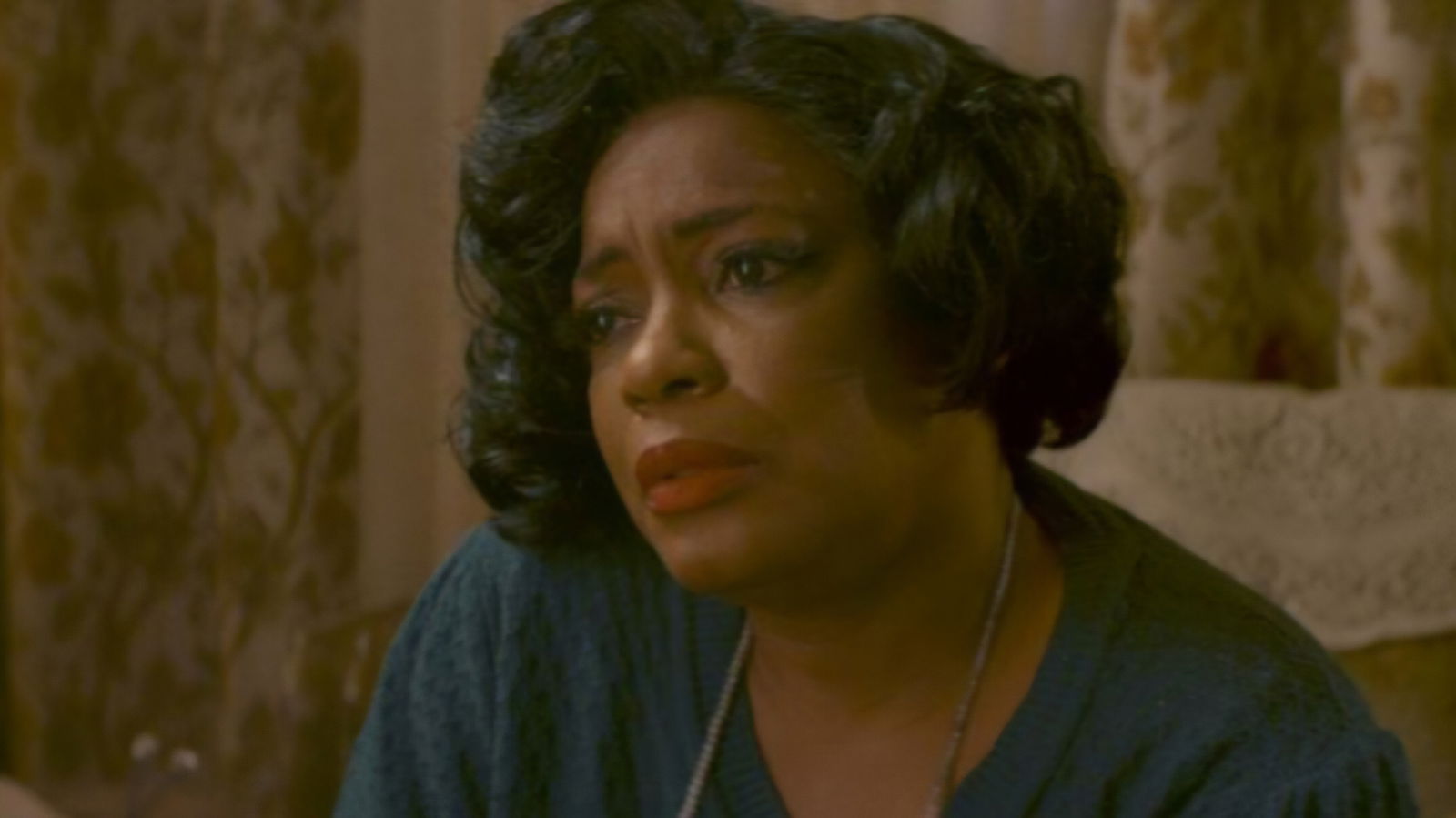 A middle-aged woman listens