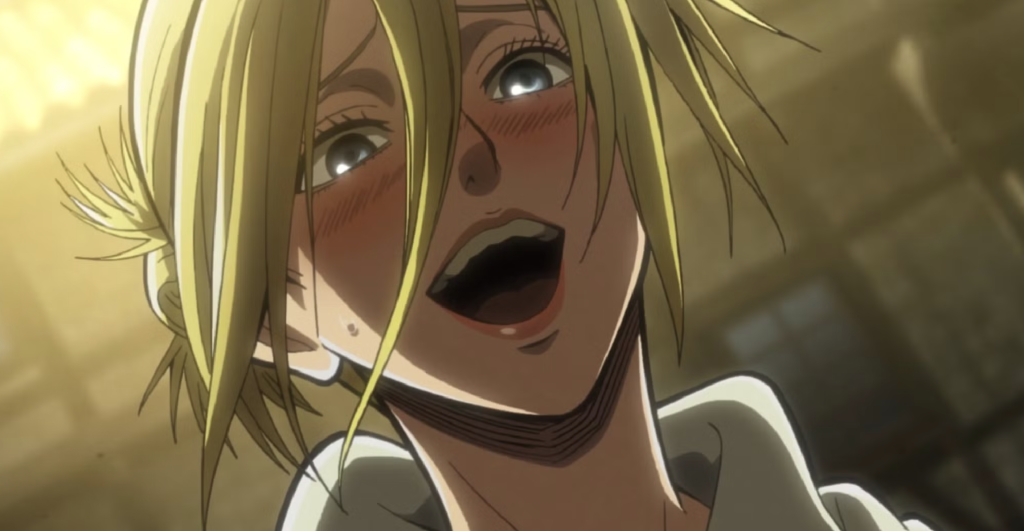 This scene features Annie Leonhart from the anime series Attack on Titan. In this moment, Annie is shown laughing hysterically after being confronted by Armin Arlert regarding her identity as the Female Titan.