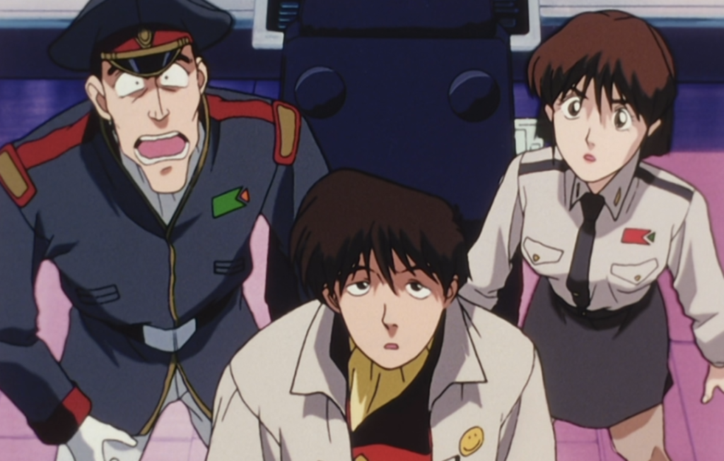 This image is from the 1993 sci-fi comedy anime series The Irresponsible Captain Tylor.The characters shown are Makoto Yamamoto (left), Justy Ueki Tylor (center), and Yuriko Star (right).