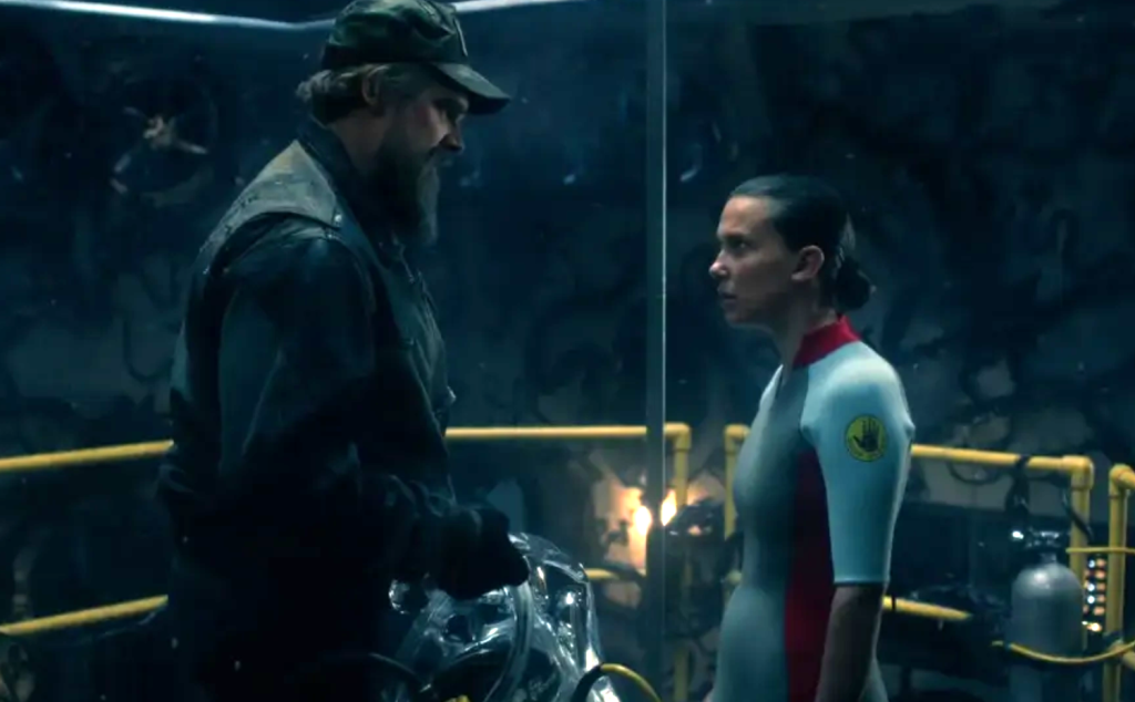 Millie Bobby Brown and David Harbour in a still from Stranger Things