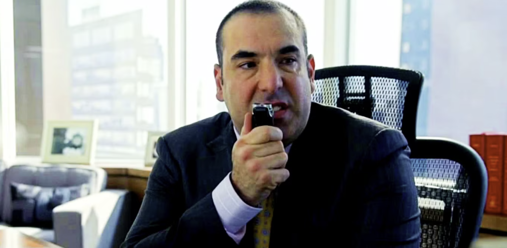 Rick Hoffman as Louis Litt in Suits