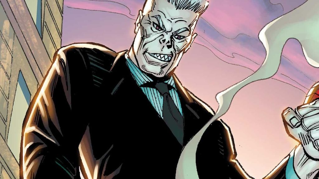 Comic book artwork of Tombstone, the albino crime boss and Spider-Man villain, wearing a black suit and grinning menacingly.